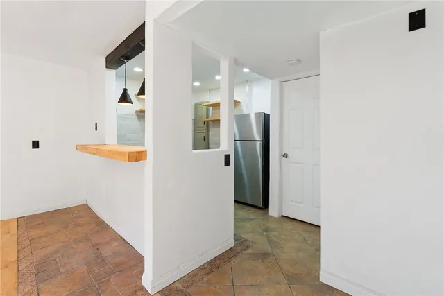 a view of a kitchen with a sink