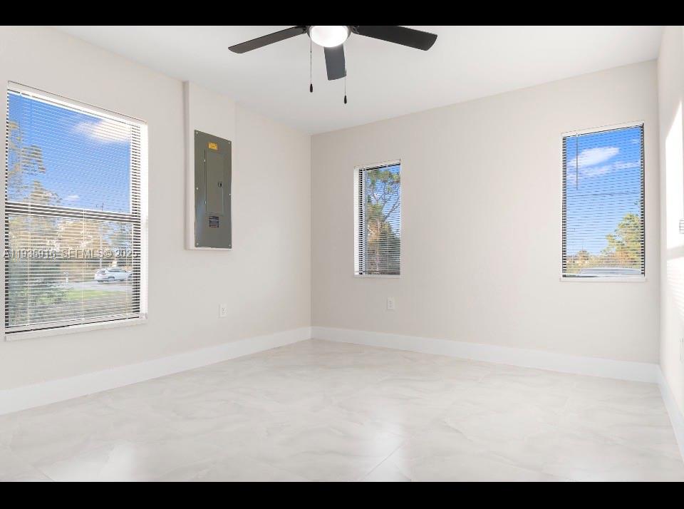 3202 Southwest 8th Street Lehigh Acres, FL 33976 - Photo 18 of 21 BEDROOM WITH WALK-IN CLOSET