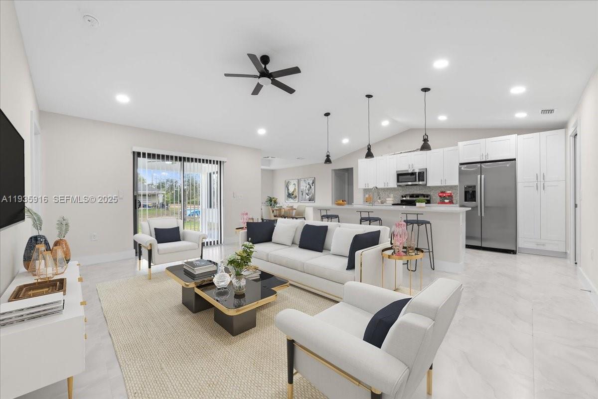 3202 Southwest 8th Street Lehigh Acres, FL 33976 - Photo 3 of 21