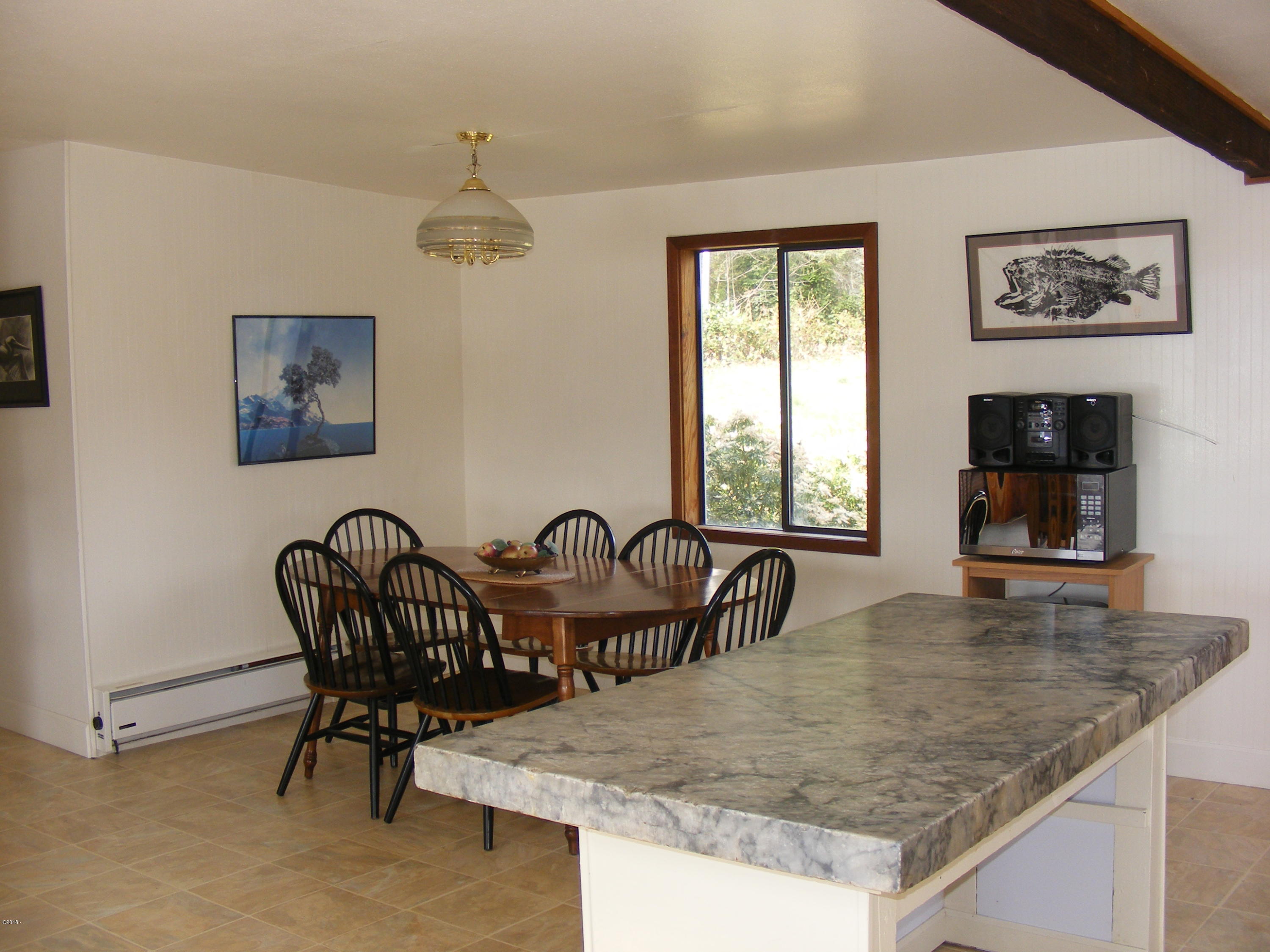 182 North Sheppard Point Road Waldport, OR 97394 - Photo 8 of 17 kitchen/dining