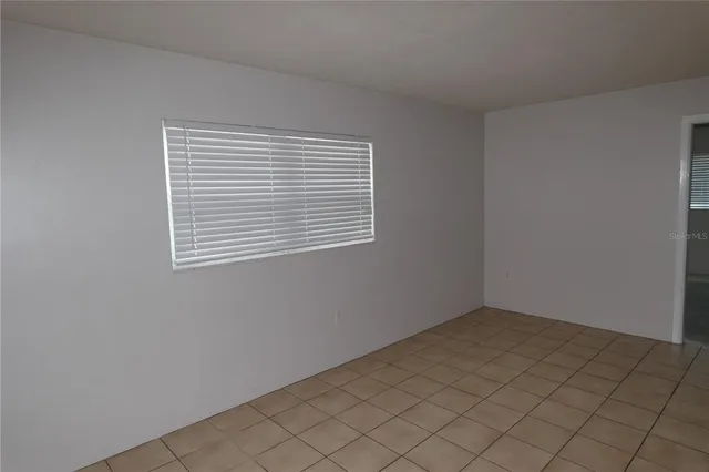 a view of a room that has a window in it