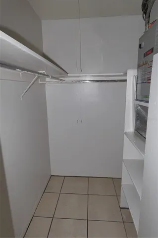a view of an empty walk in closet