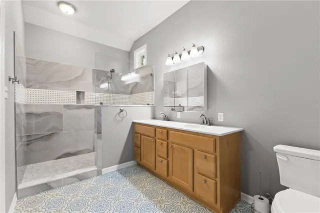 a bathroom with a sink and a toilet