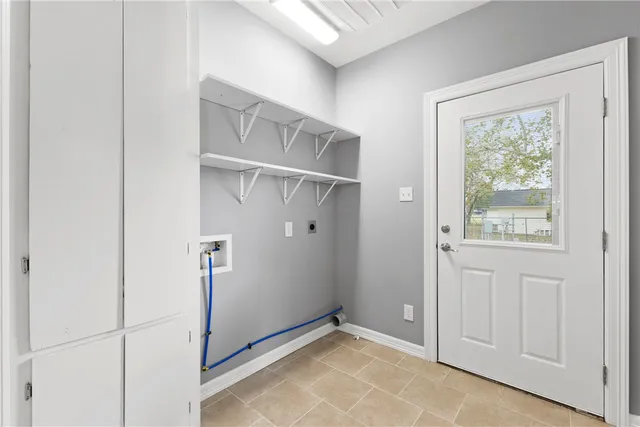 a kitchen with a stove and a cabinet