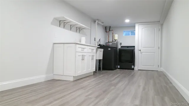 a view of kitchen with wooden floor