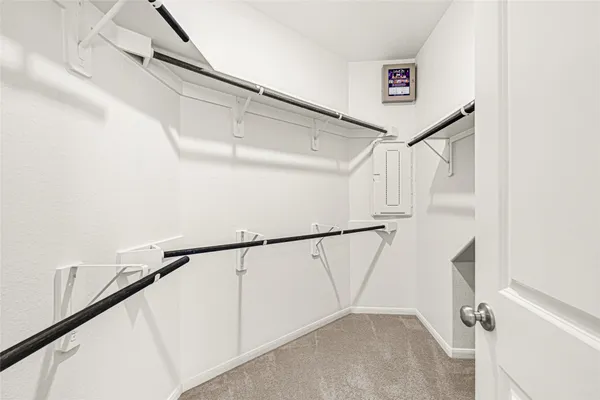 a view of a hallway with stairs