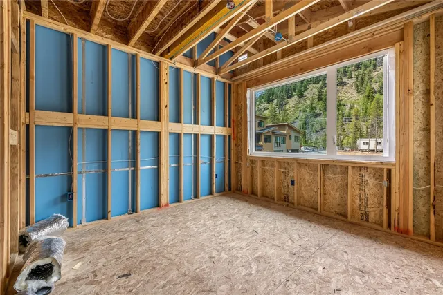 a view of a room with a large window