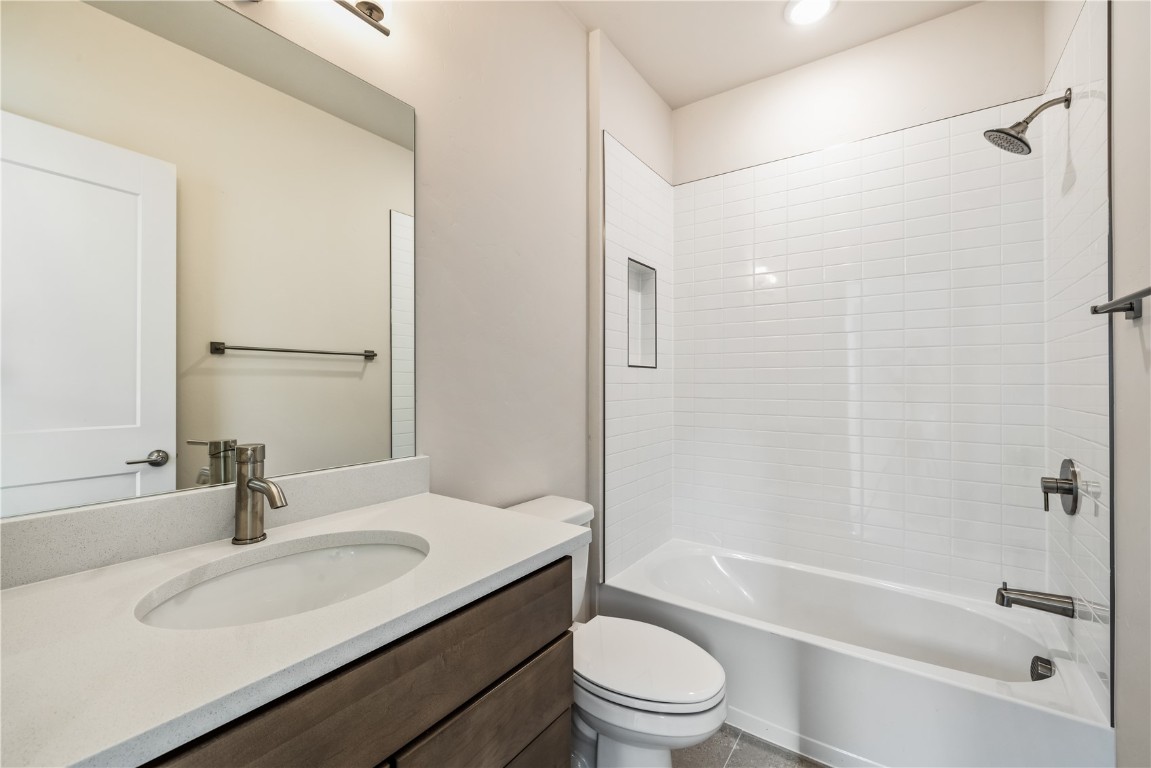 632 Montezuma Road, Unit C2 Keystone, CO 80435 - Photo 21 of 36 a bathroom with a granite countertop sink toilet and shower