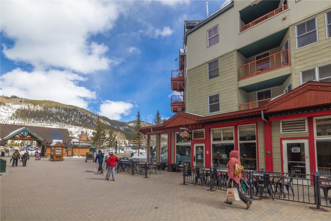 632 Montezuma Road, Unit C2 Keystone, CO 80435 - Photo 21 of 40 a view of a building with a lot of people on a street