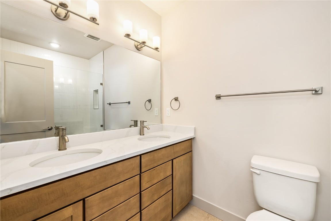632 Montezuma Road, Unit C2 Keystone, CO 80435 - Photo 22 of 40 a bathroom with a sink toilet double vanity and tub