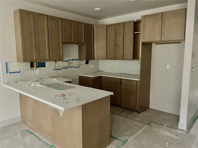 a view of entryway with livingroom