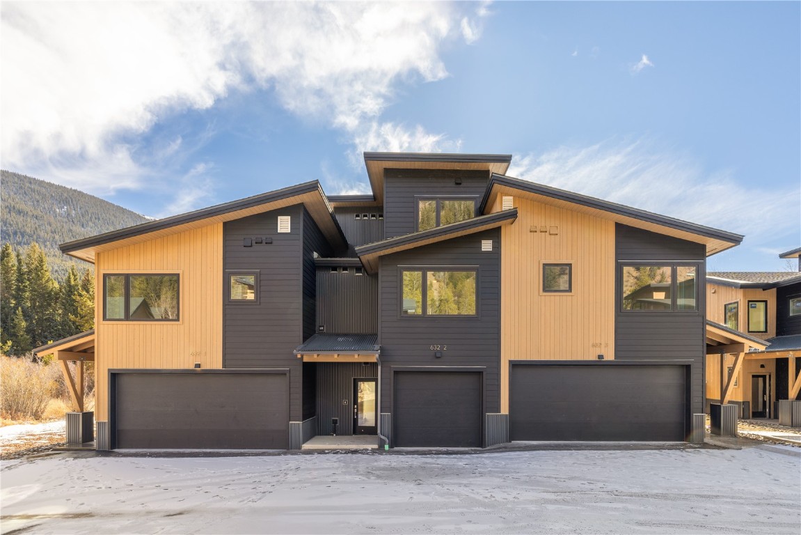 632 Montezuma Road, Unit C2 Keystone, CO 80435 - Photo 26 of 36 a front view of a house with many windows