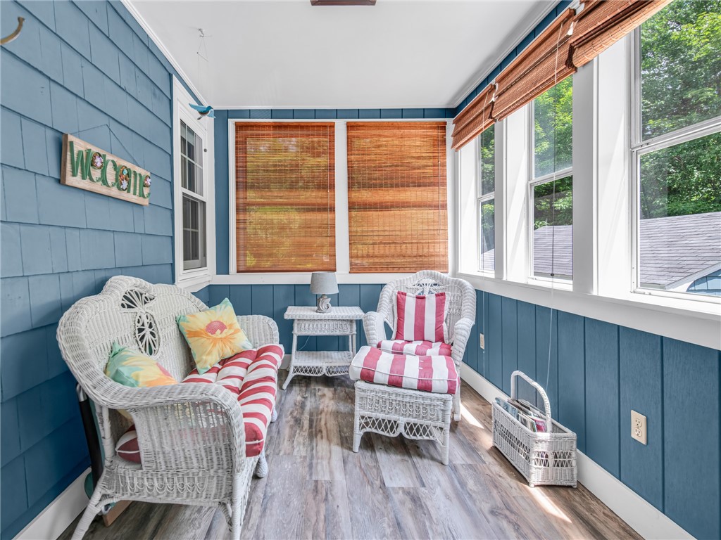 335 Eagle Peak Road Burrillville, RI 02859 - Photo 16 of 35 Screened porch with access from driveway