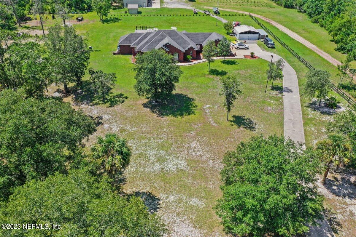 35440 Quail Road Callahan, FL 32011 - Photo 1 of 34 an aerial view of a house with a yard
