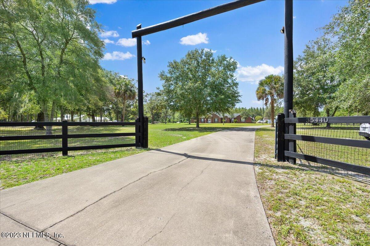 35440 Quail Road Callahan, FL 32011 - Photo 3 of 34 a view of backyard with green space