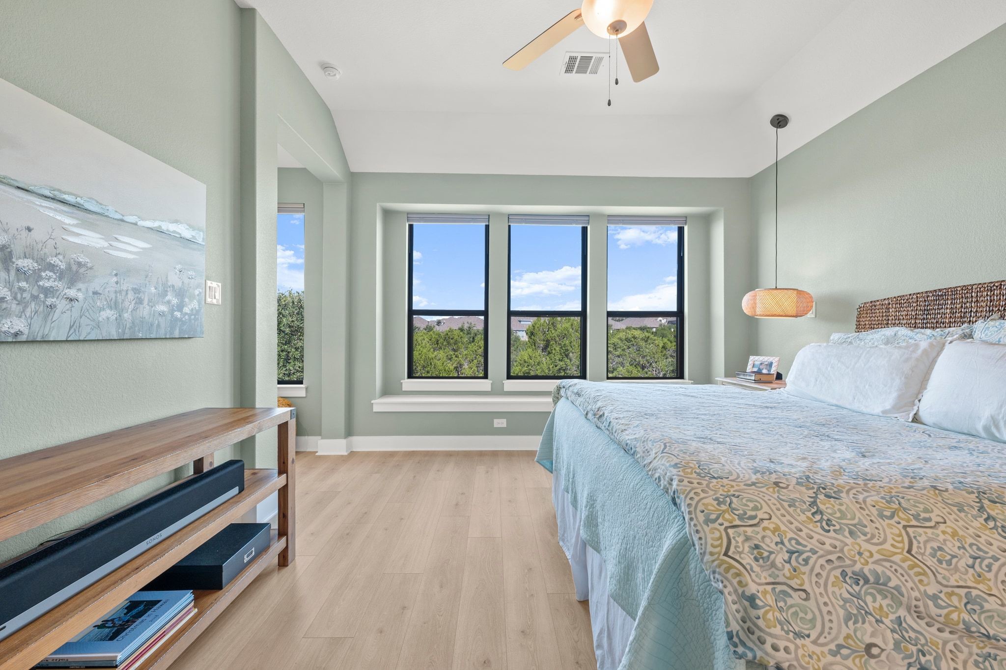 7804 Pace Ravine Drive Lago Vista, TX 78645 - Photo 13 of 34 a bedroom with a bed and a large window