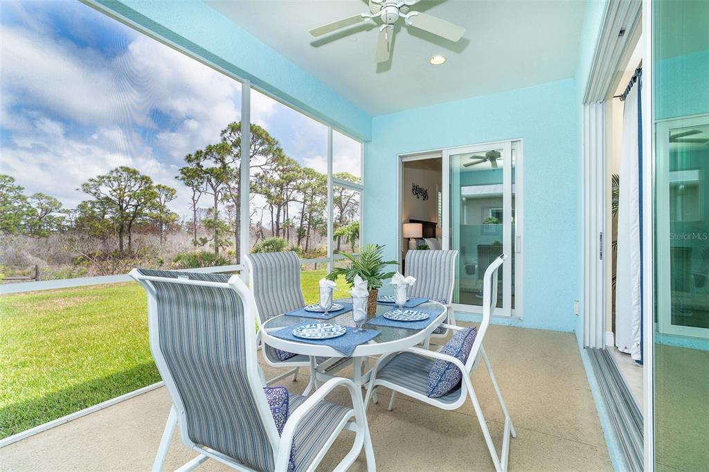 8952 Scallop Way Placida, FL 33946 - Photo 20 of 52 a view of an outdoor dining space with a table and chairs