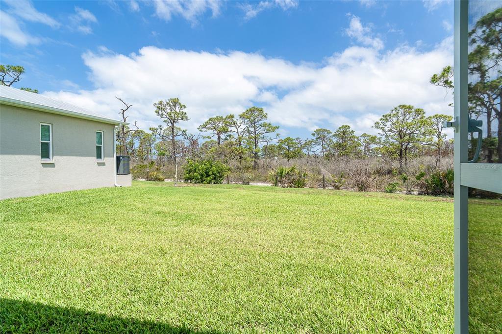 8952 Scallop Way Placida, FL 33946 - Photo 22 of 52 a view of a backyard