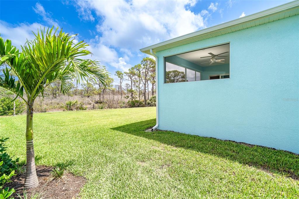 8952 Scallop Way Placida, FL 33946 - Photo 23 of 52 a view of an outdoor space and a yard