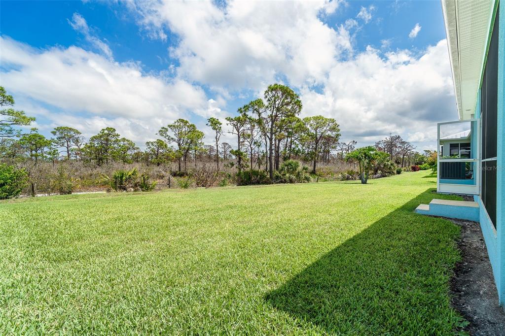 8952 Scallop Way Placida, FL 33946 - Photo 24 of 52 a view of a yard and entertaining space