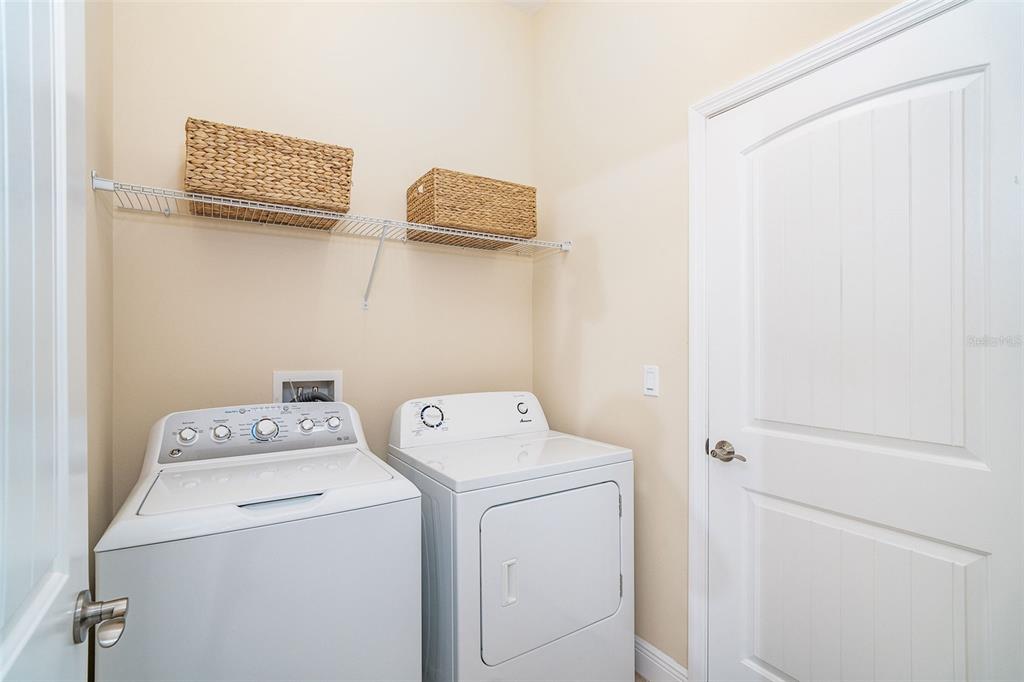 8952 Scallop Way Placida, FL 33946 - Photo 41 of 52 a utility room with dryer and washer