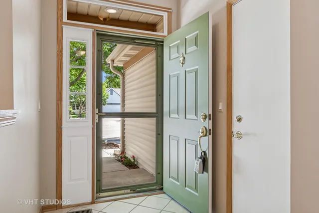 a kitchen with stainless steel appliances granite countertop a stove sink and cabinets