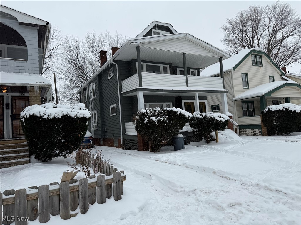 16309 Nela View Road Cleveland, OH 44112 - Photo 2 of 29 View of front of home with a chimney
