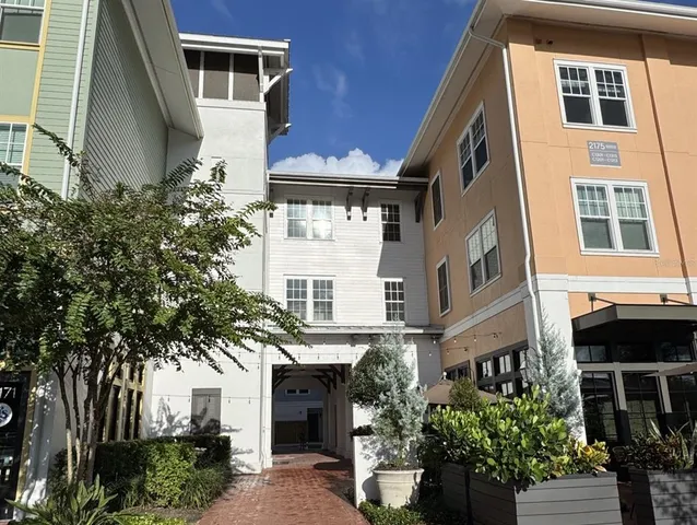 a view of a building with a tree
