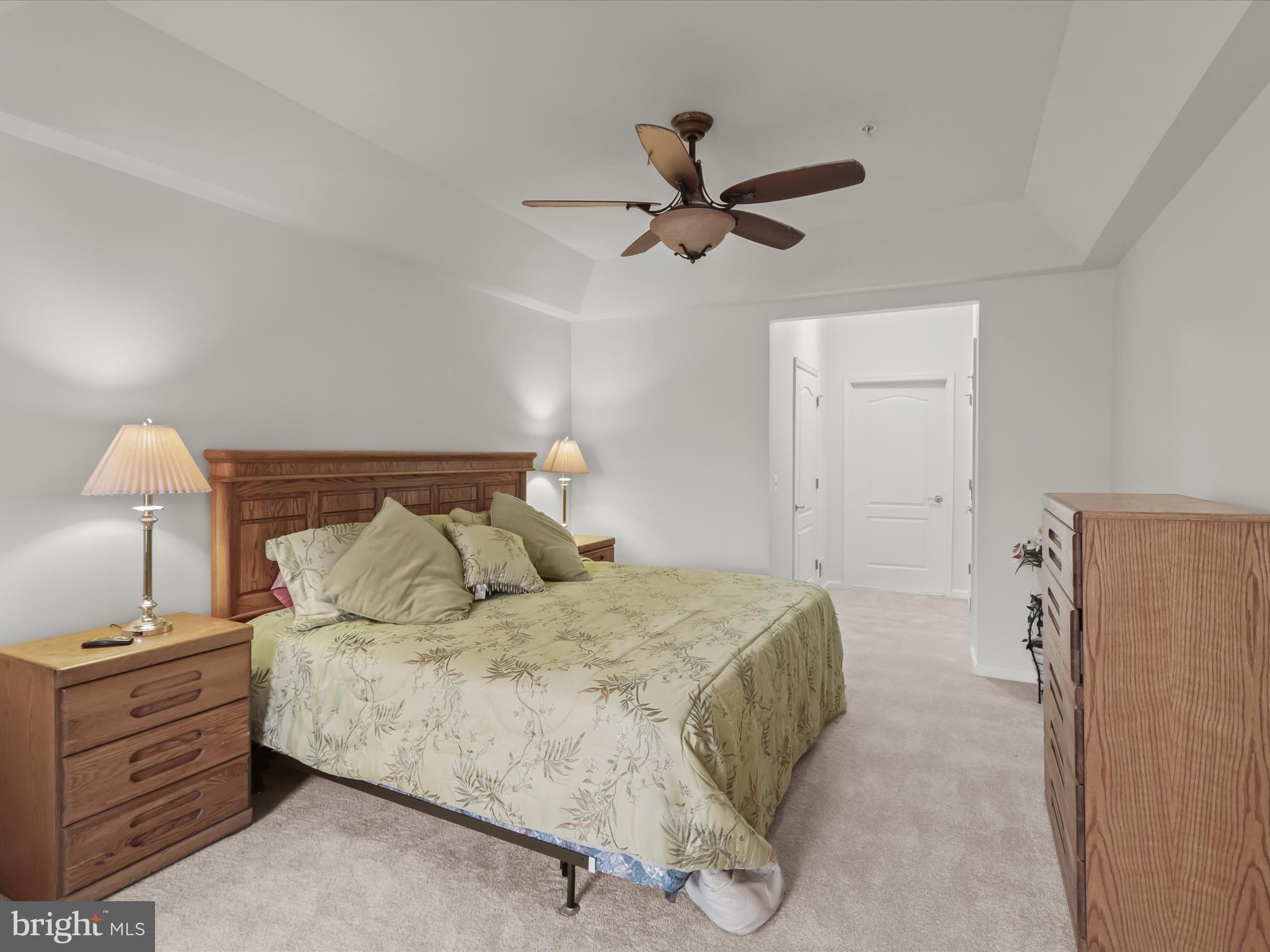 7325 Brookview Road, Unit 208 Elkridge, MD 21075 - Photo 17 of 31 a bedroom with a bed and a window