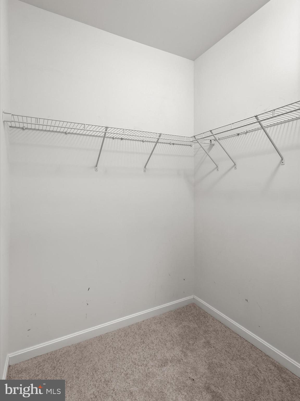7325 Brookview Road, Unit 208 Elkridge, MD 21075 - Photo 26 of 31 a view of a room with racks on the wall
