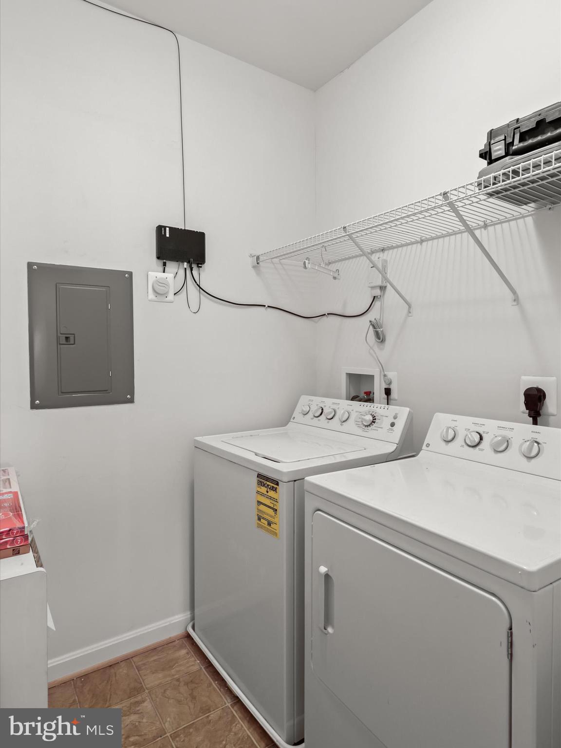 7325 Brookview Road, Unit 208 Elkridge, MD 21075 - Photo 29 of 31 a utility room with dryer and washer