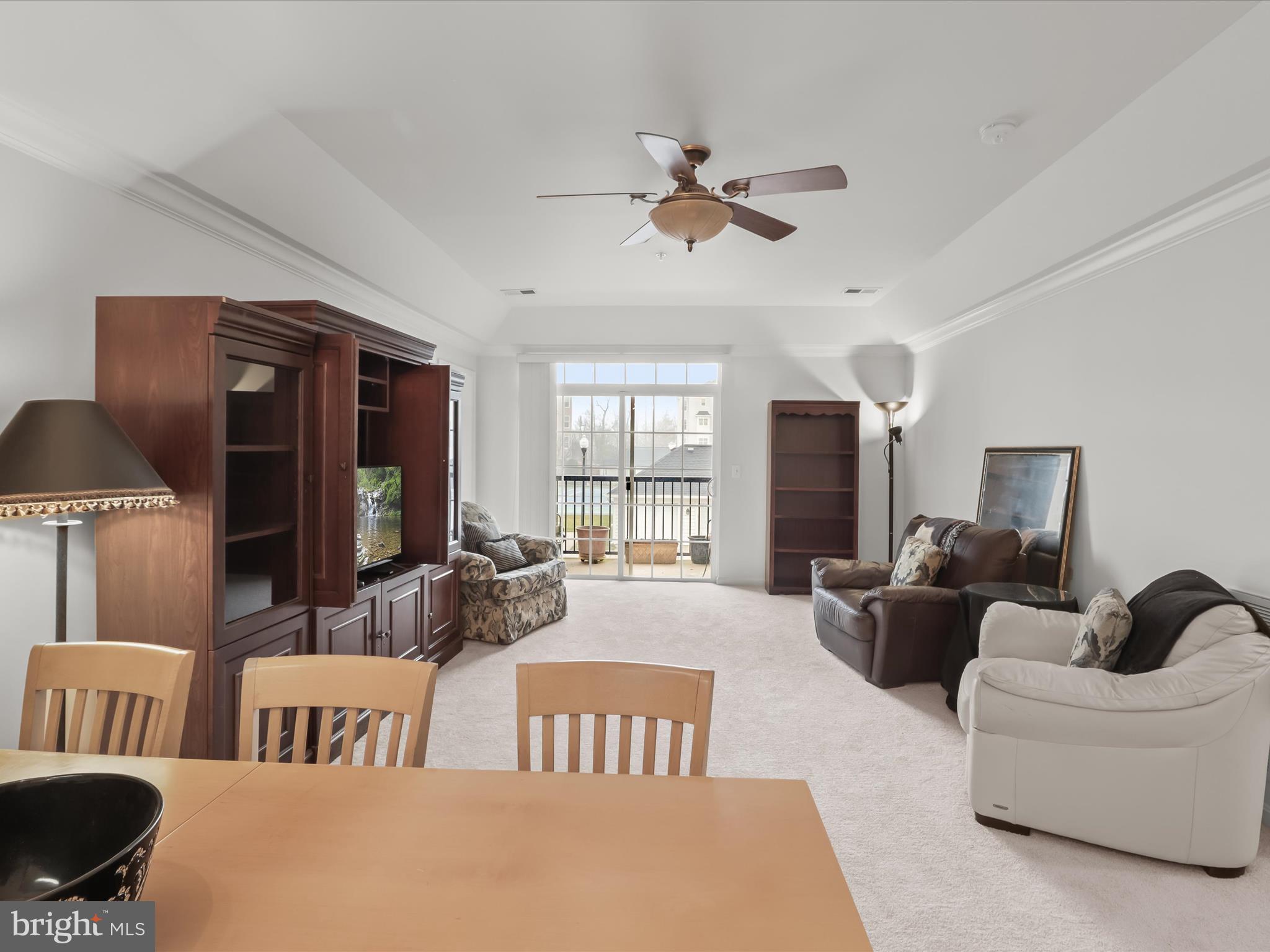7325 Brookview Road, Unit 208 Elkridge, MD 21075 - Photo 9 of 31 a living room with furniture and a flat screen tv