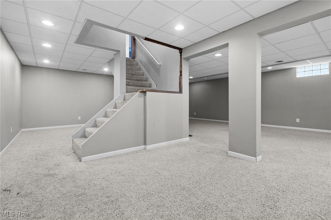5700 Birmingham Road Northeast Canton, OH 44721 - Photo 30 of 37 Recreation room, 27 x 26, recessed lighting, light carpeting and storage