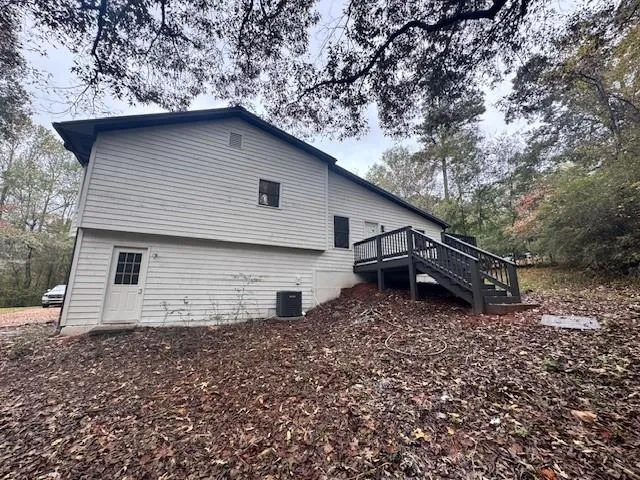 a house with a tree in the background