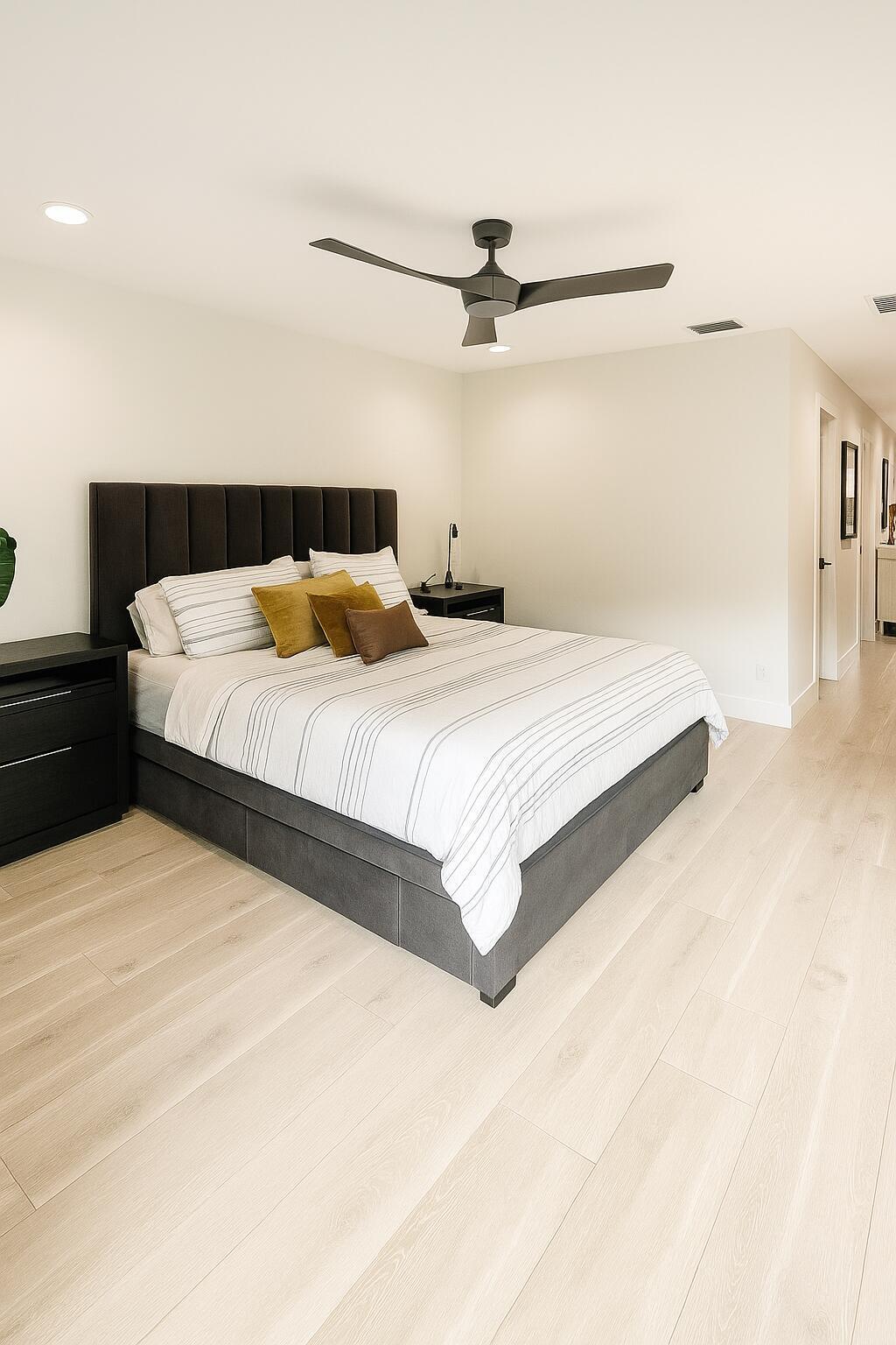 1853 Shower Tree Way Wellington, FL 33414 - Photo 38 of 51 20250903_1502_Bright Master Bedroom_remi