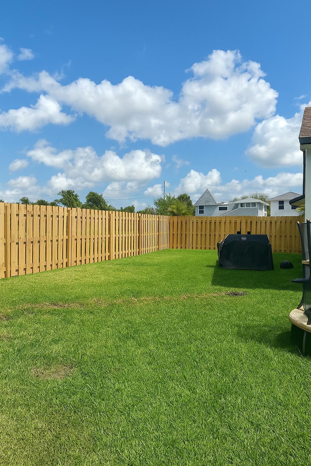 1853 Shower Tree Way Wellington, FL 33414 - Photo 50 of 51 20250903_2119_Sunny Backyard Scene_remix