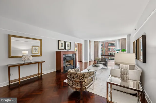 a living room with furniture or couch and a wooden floor