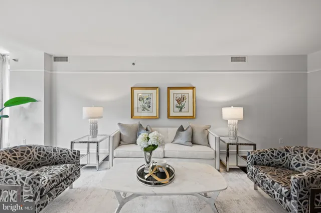 a living room with furniture and a couch