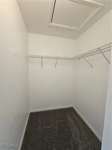 a view of a room with racks on the wall