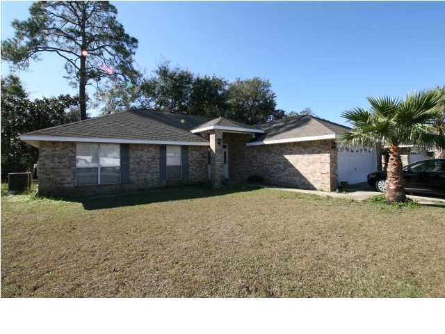 274 Beacon Way Miramar Beach, FL 32550 - Photo 1 of 8 a house view with a backyard space