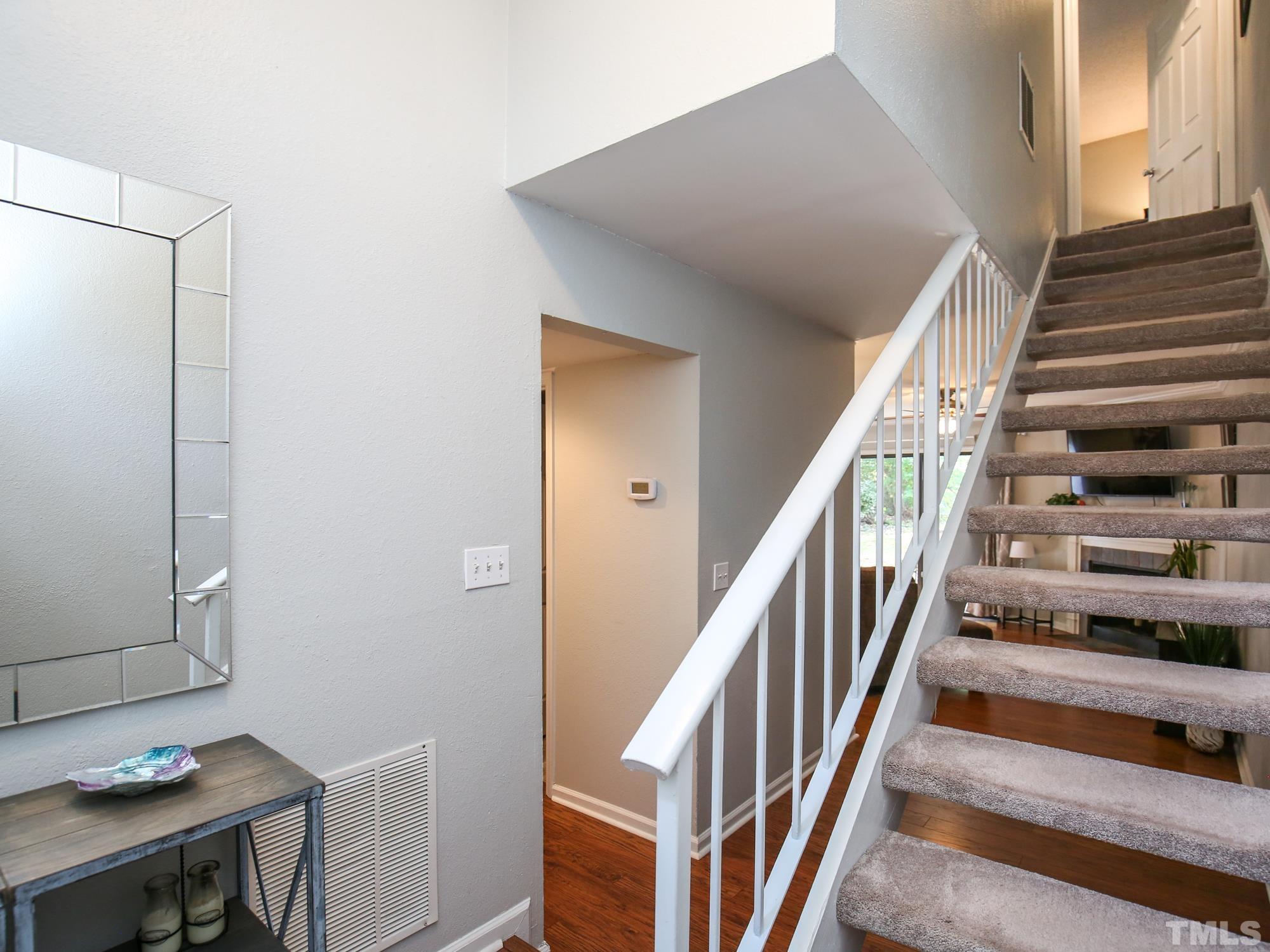 2429 Condor Court, Unit 2429 Raleigh, NC 27615 - Photo 14 of 26 a view of entryway with wooden floor