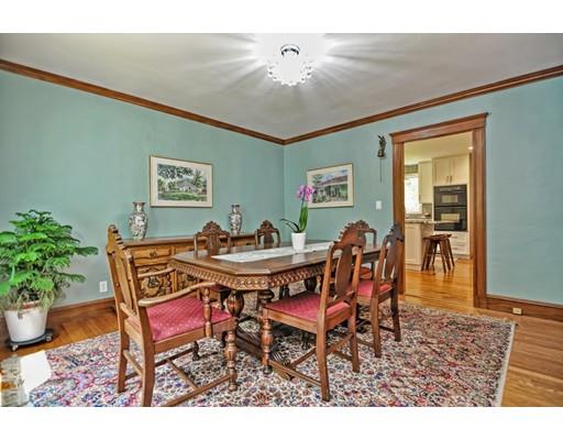 317 North Street Walpole, MA 02081 - Photo 17 of 27 a dining room with furniture potted plants and wooden floor