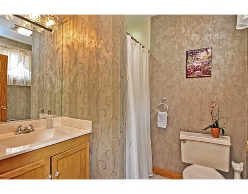 317 North Street Walpole, MA 02081 - Photo 18 of 27 a bathroom with a sink a toilet and shower