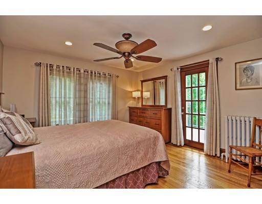 317 North Street Walpole, MA 02081 - Photo 21 of 27 a bedroom with a bed and a large window