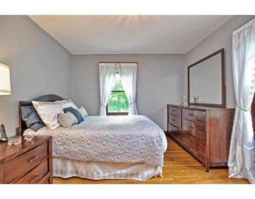 317 North Street Walpole, MA 02081 - Photo 23 of 27 a bedroom with a bed window and dresser