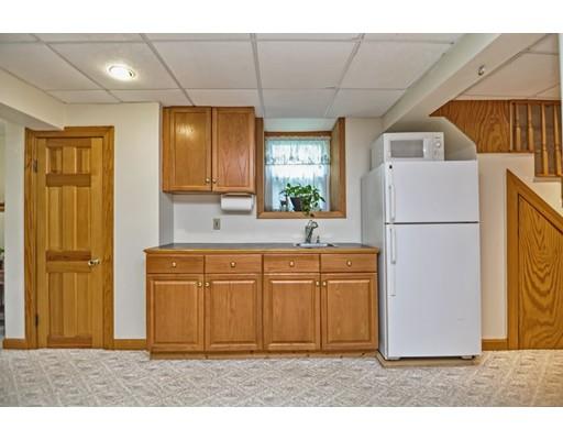 317 North Street Walpole, MA 02081 - Photo 25 of 27 a kitchen with stainless steel appliances granite countertop a refrigerator a sink and a refrigerator