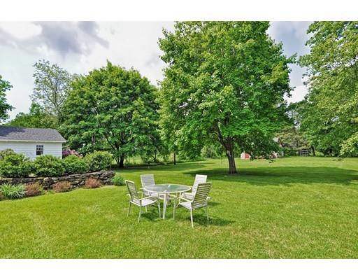 317 North Street Walpole, MA 02081 - Photo 5 of 27 a table and chairs in the garden