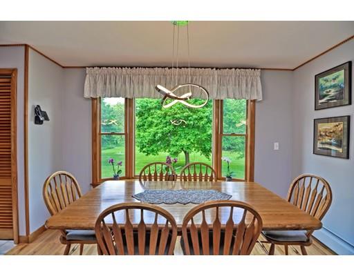 317 North Street Walpole, MA 02081 - Photo 9 of 27 a view of a dining room with furniture window and outside view