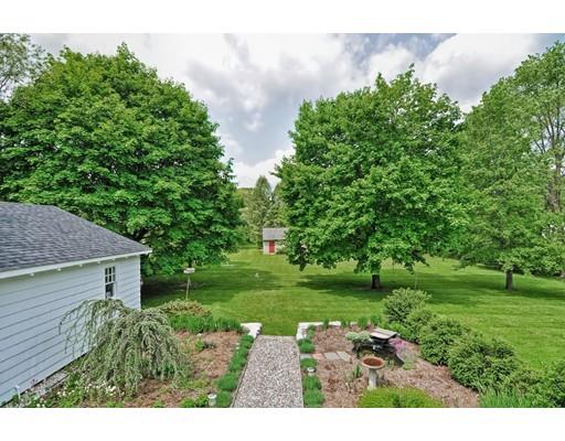 317 North Street Walpole, MA 02081 - Photo 10 of 27 a backyard of a house with lots of green space