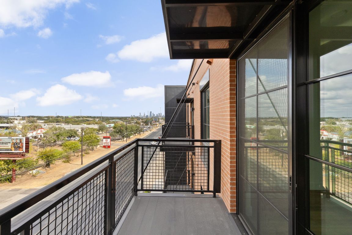 4315 South Congress Avenue, Unit 523 Austin, TX 78745 - Photo 27 of 32 a view of a balcony with city view